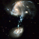 Illustration for article titled A Cosmic Fountain of Foamy Galaxies and Blue Giant Stars